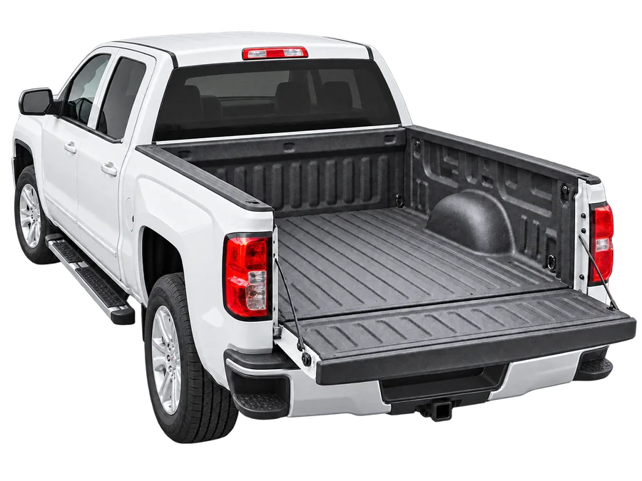 White pickup truck with spray-in bedliner and open tailgate